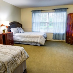 Relax and recharge in beautiful and spacious bedrooms a bedroom with two beds and large windows