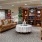 spacious clubhouse with couches and bookshelves